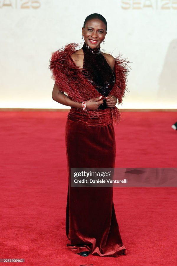 Burgundy sequin velvet gown with fur cape