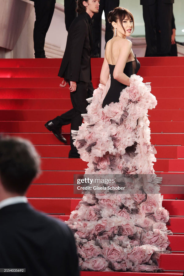 Black mermaid with floral pink cape