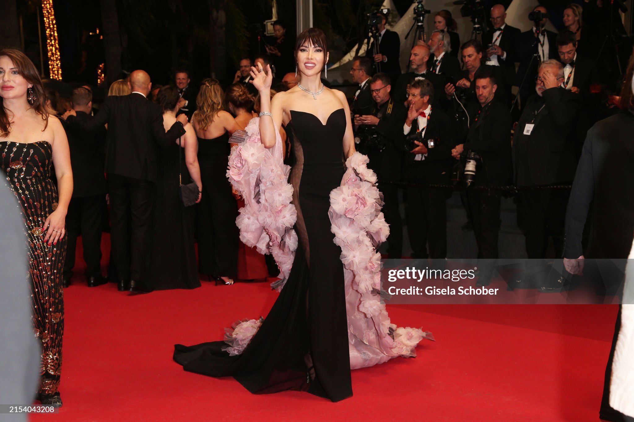 Black mermaid with floral pink cape