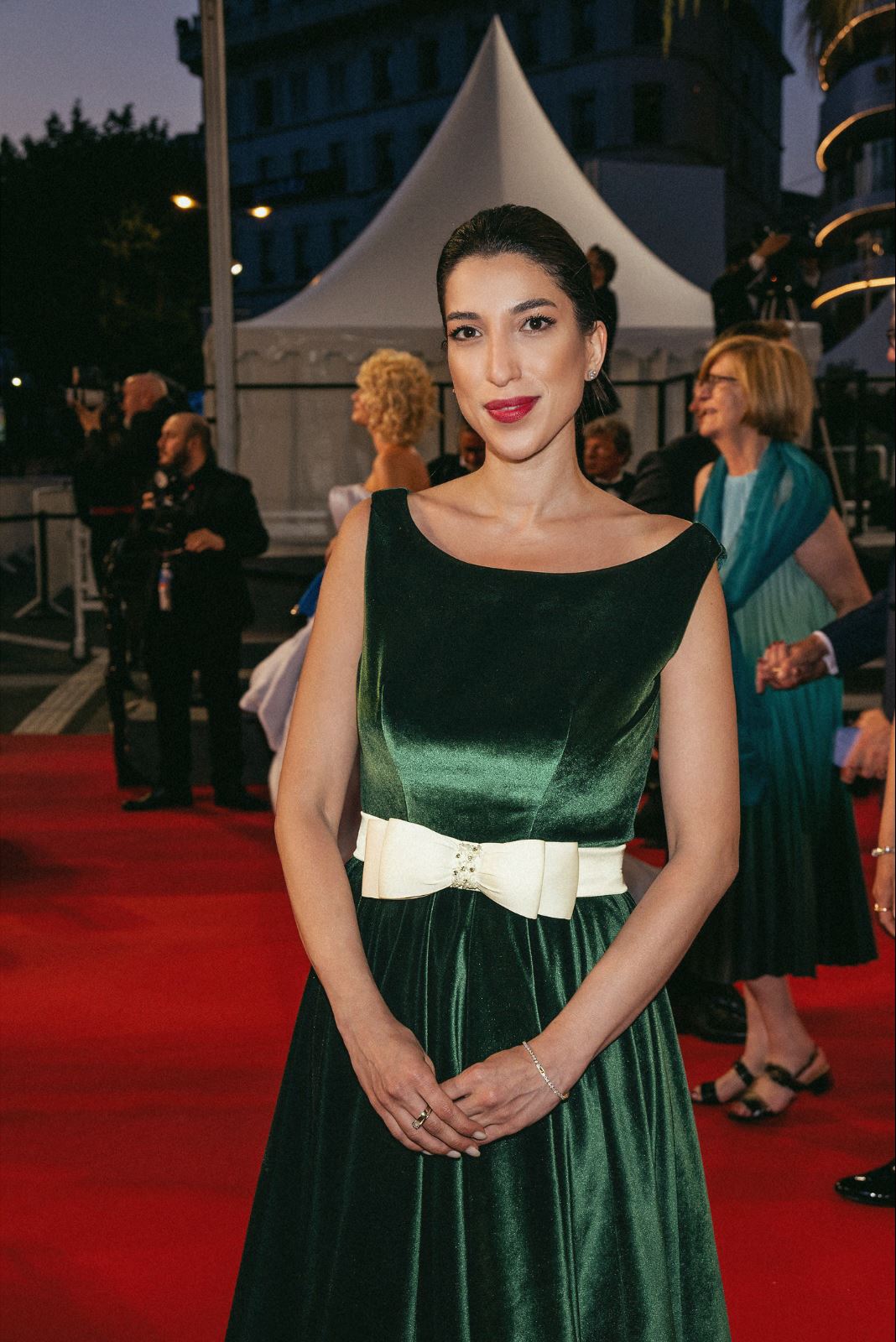 Emerald velvet ivory-bow gown
