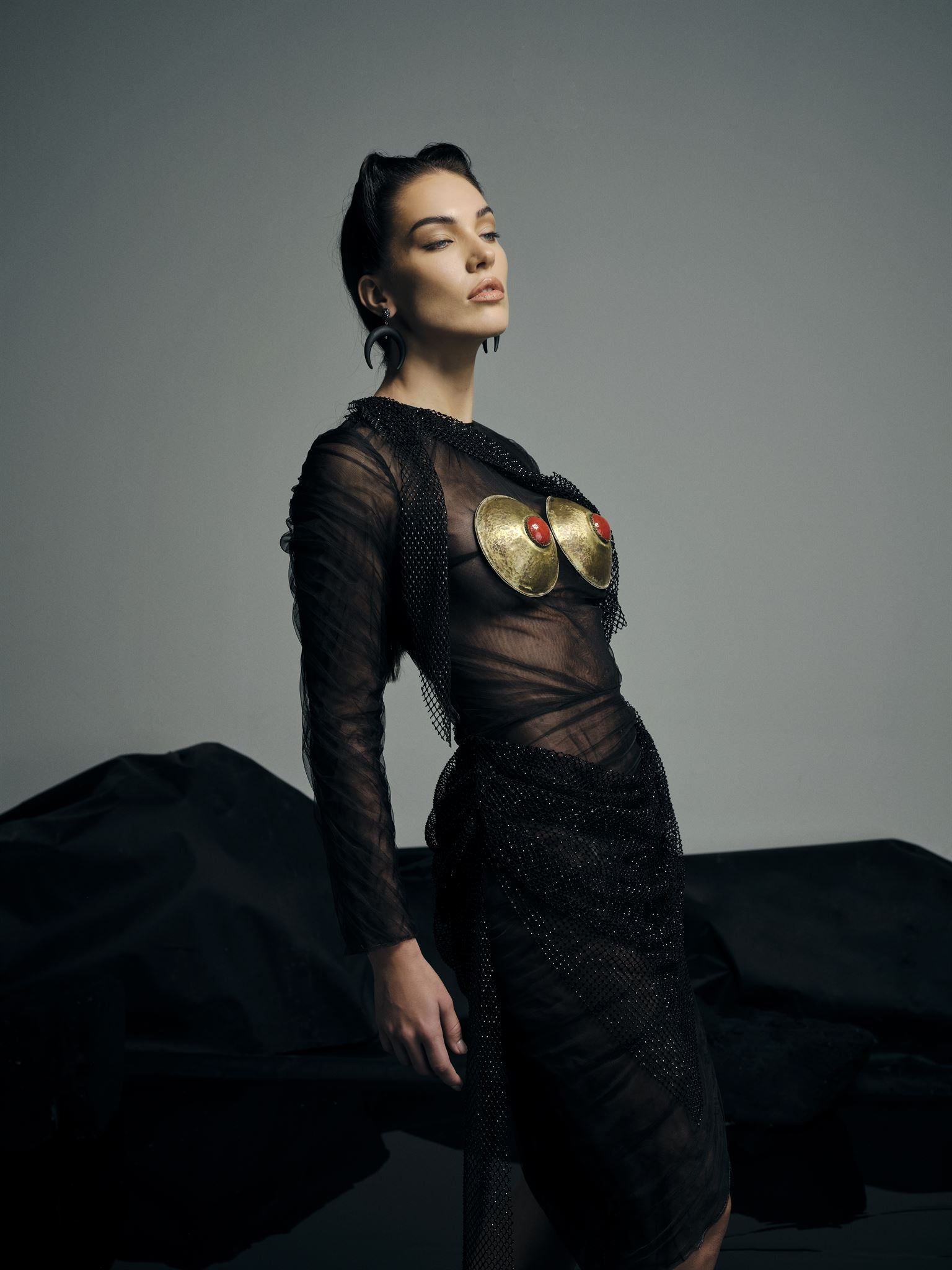 Black sheer brass breastplate gown