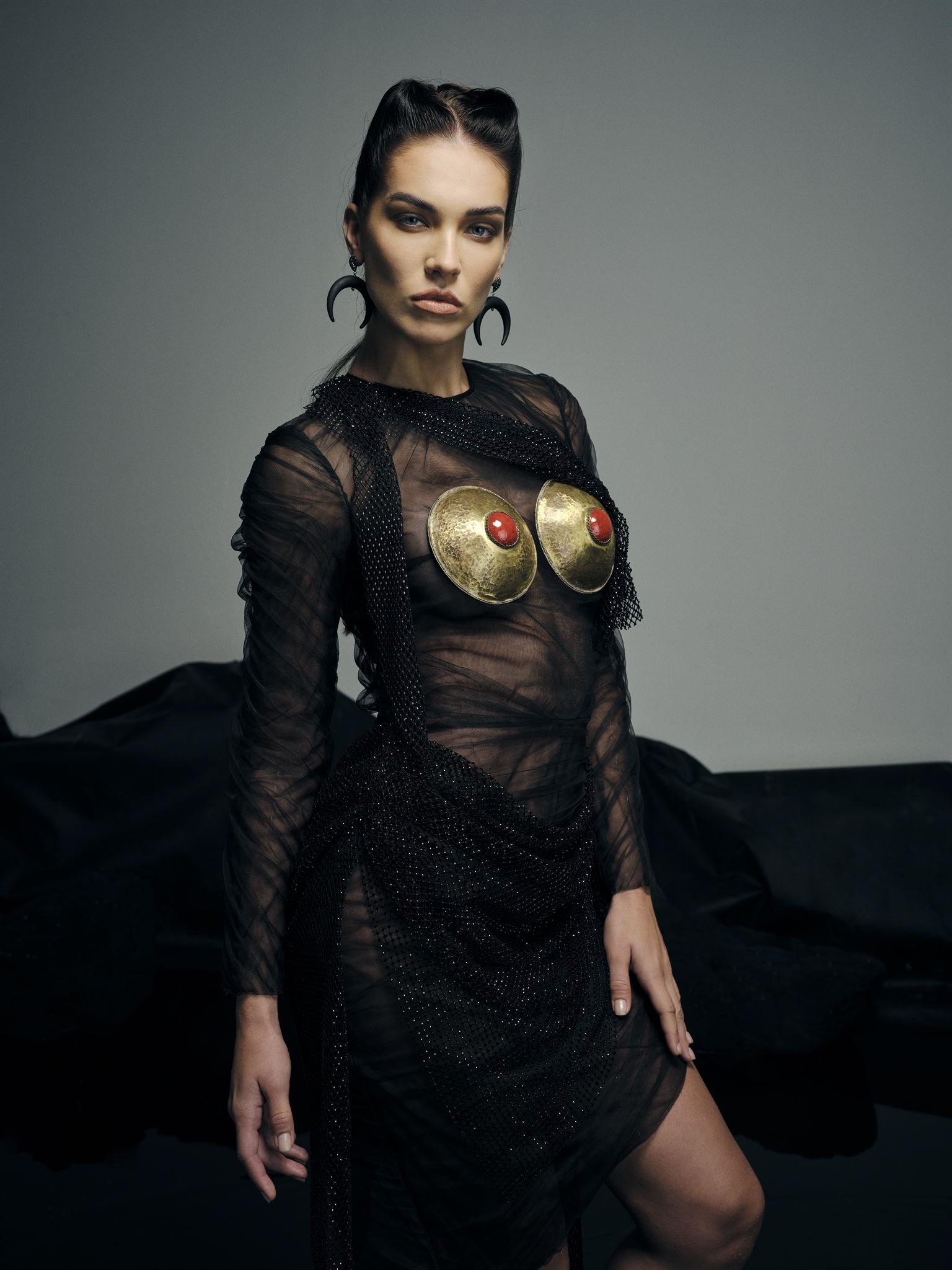 Black sheer brass breastplate gown
