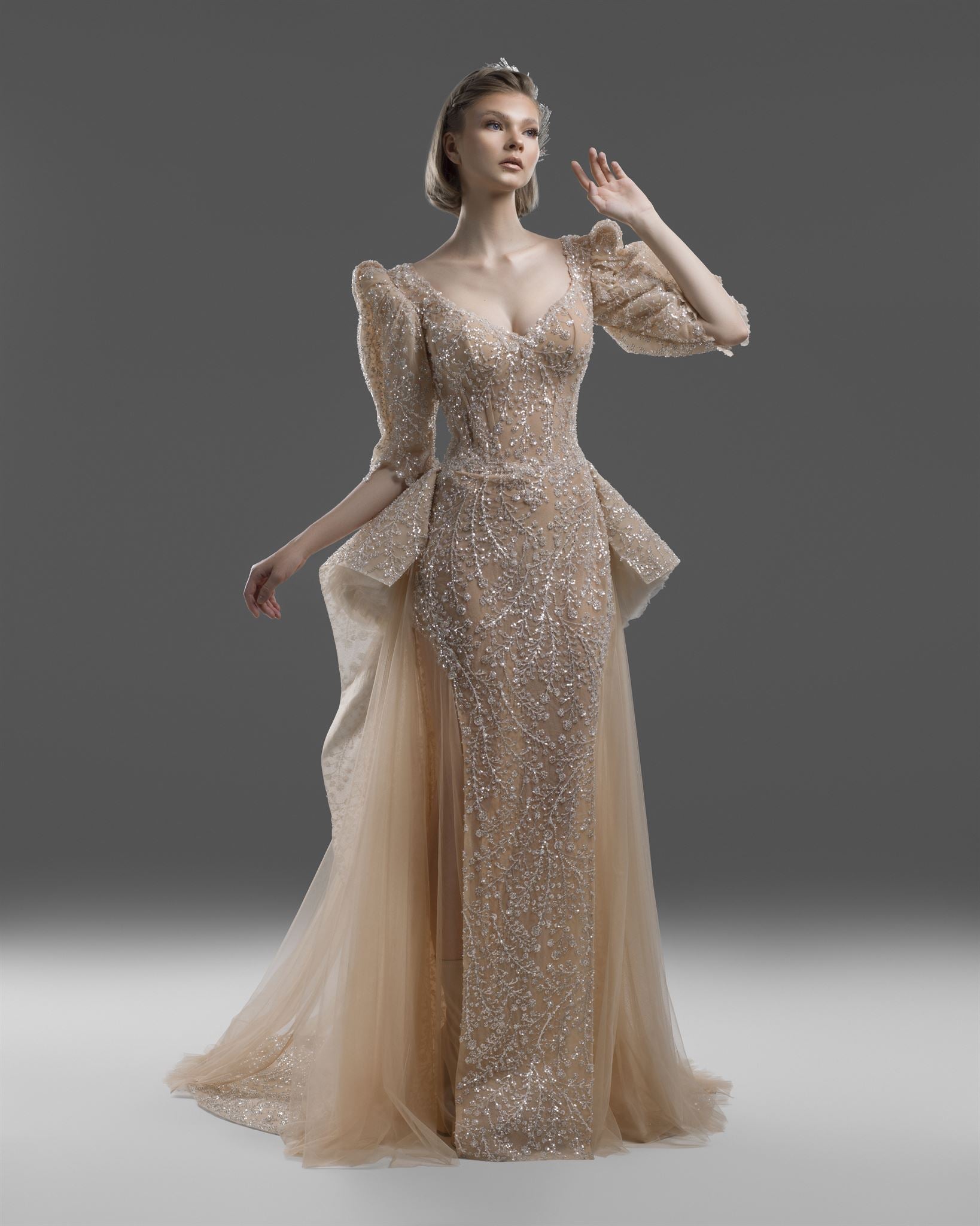 Nude beaded puff-sleeve gown