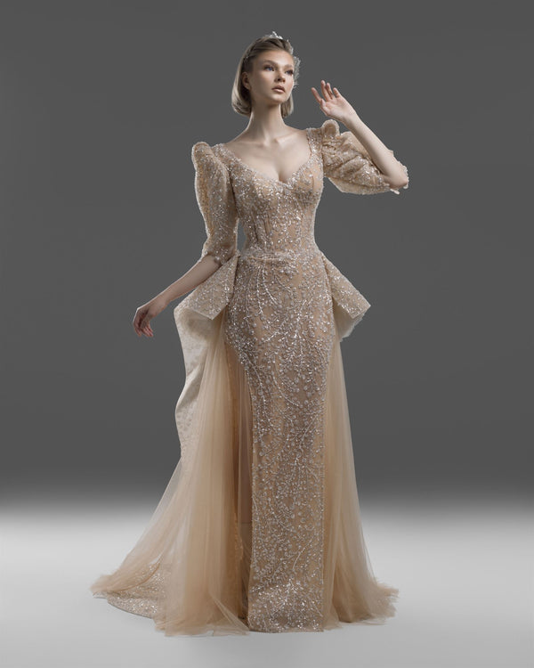 Nude beaded puff-sleeve gown