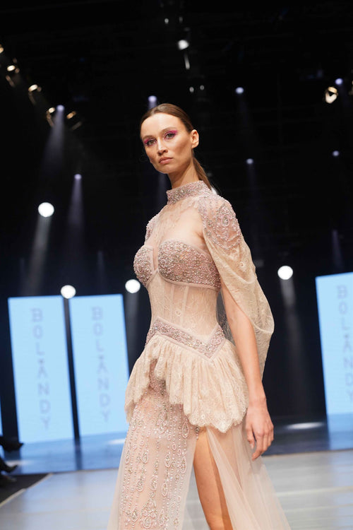 Blush nude cape-sleeve gown