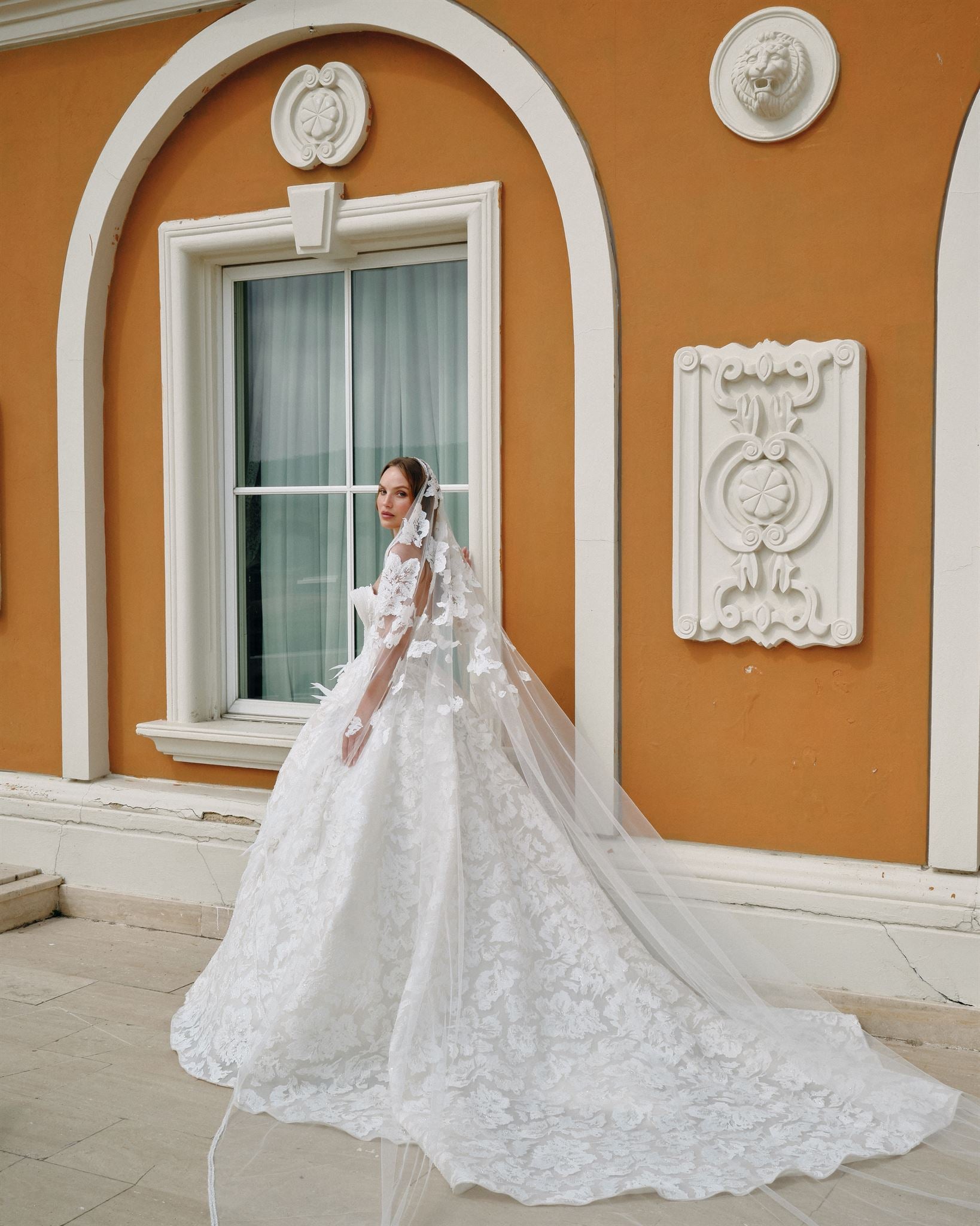 Appliquéd tulle A-line couture gown