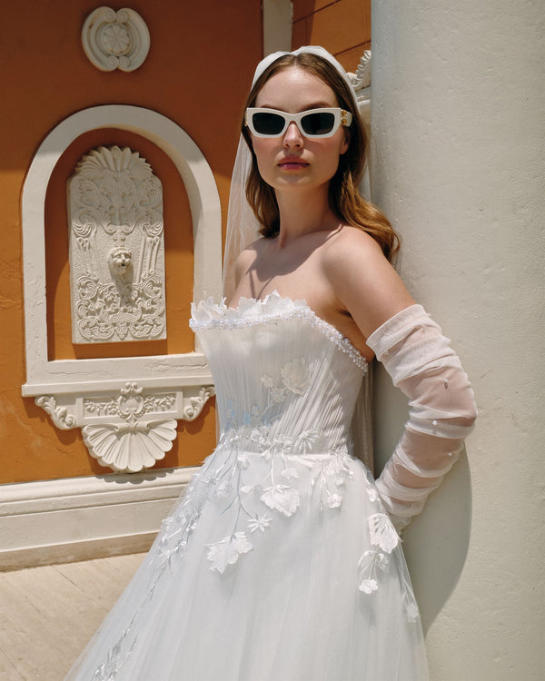 Strapless floral appliqué A-line gown