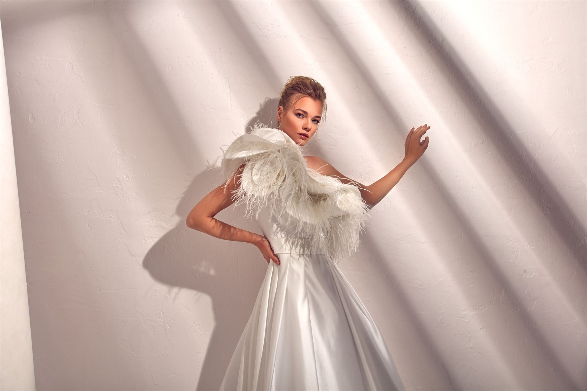 One-shoulder feathered satin A-line gown