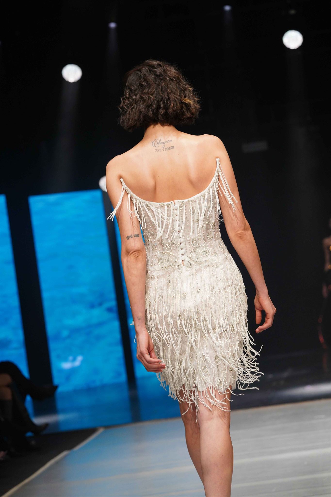 Feathered embellished strapless mini