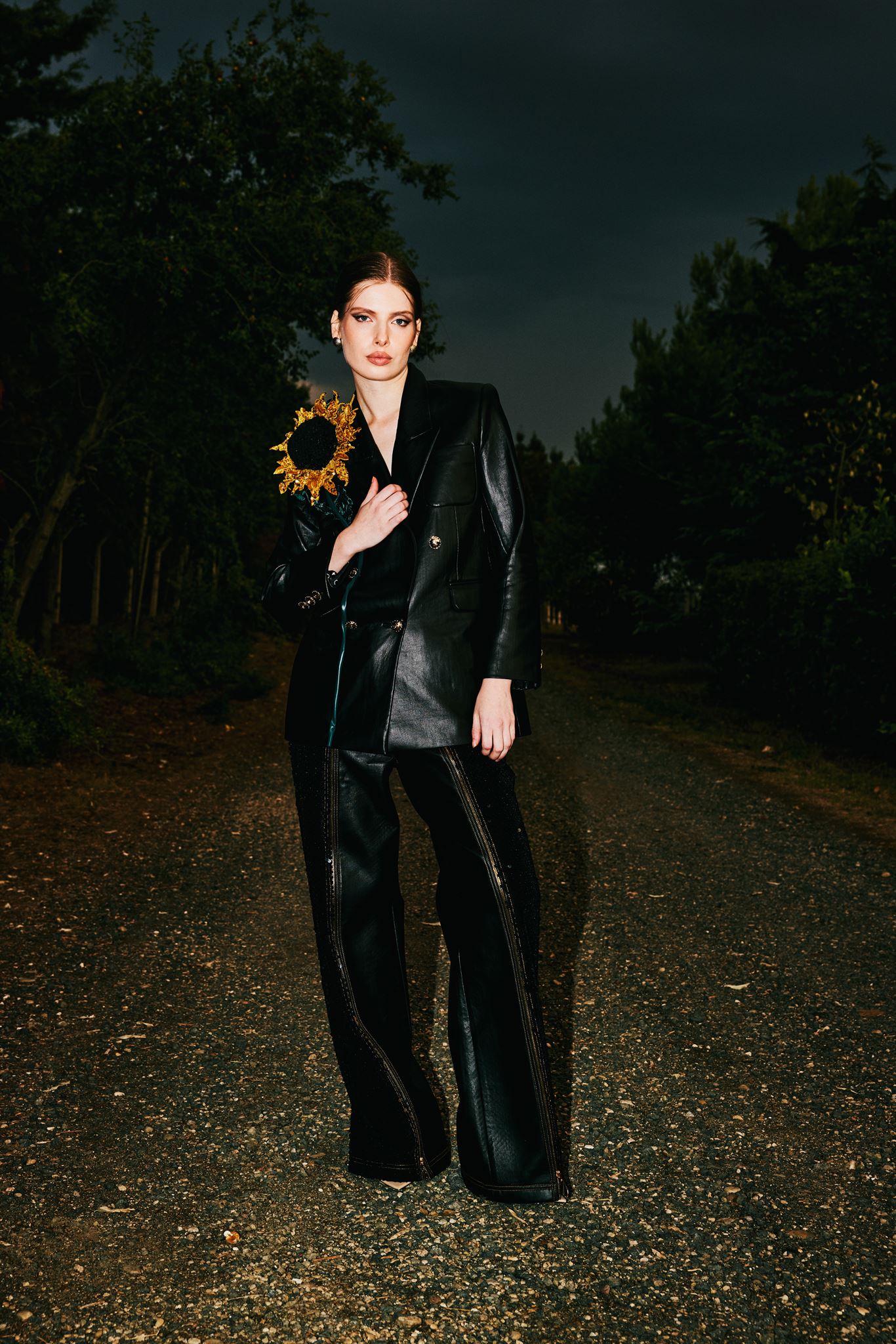 Black leather sunflower trouser suit