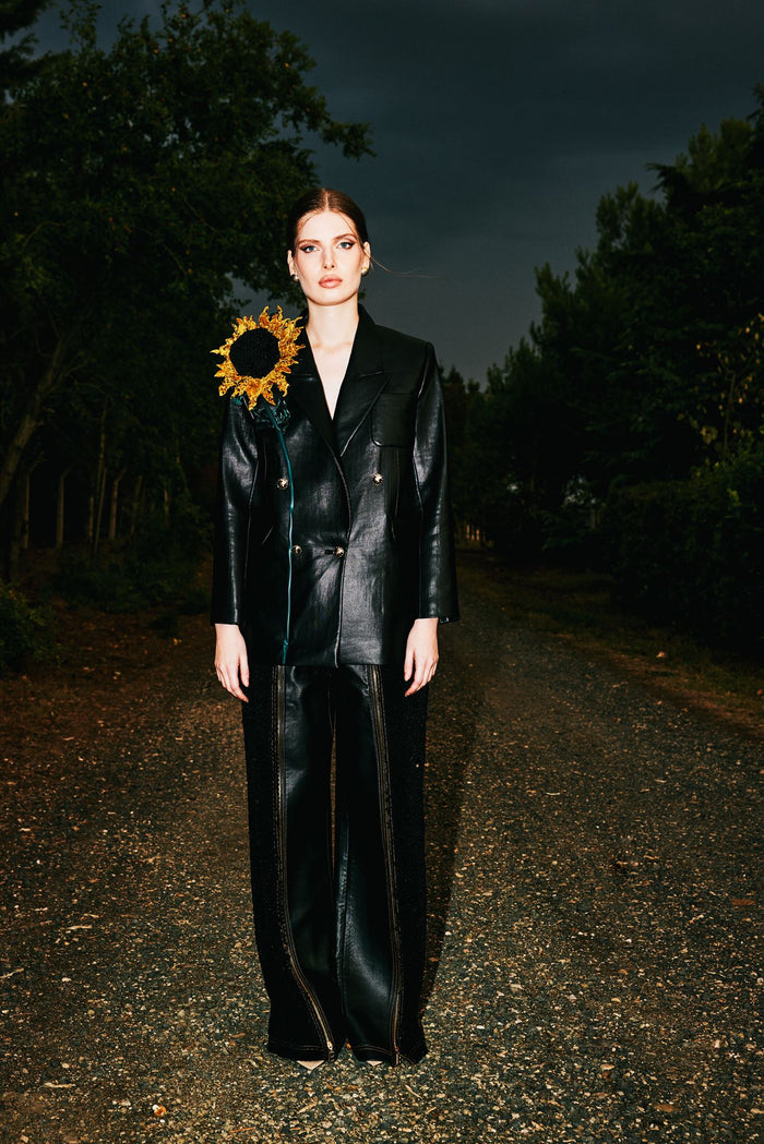 Black leather sunflower trouser suit