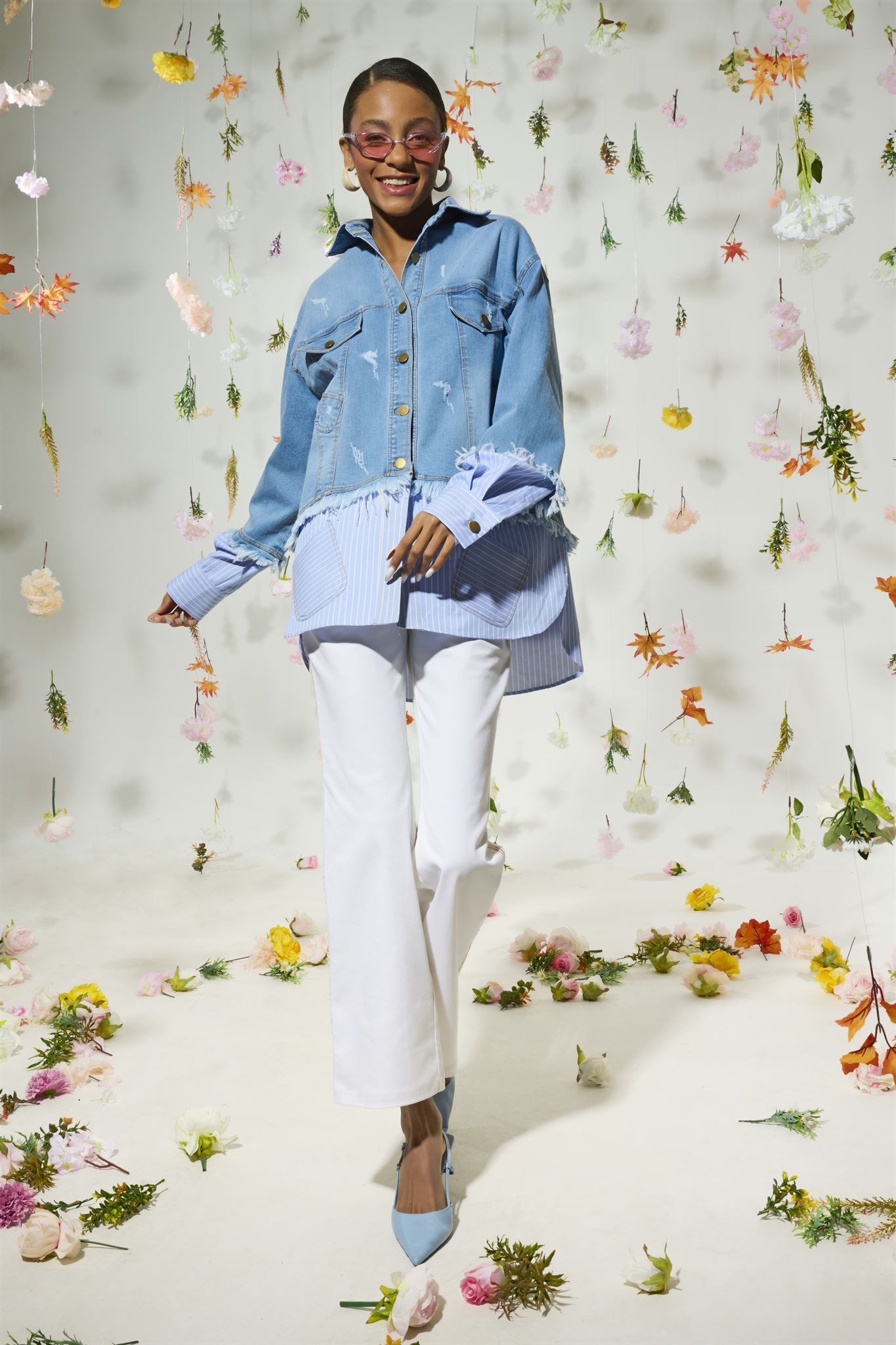 Light blue denim jacket with striped shirt layer