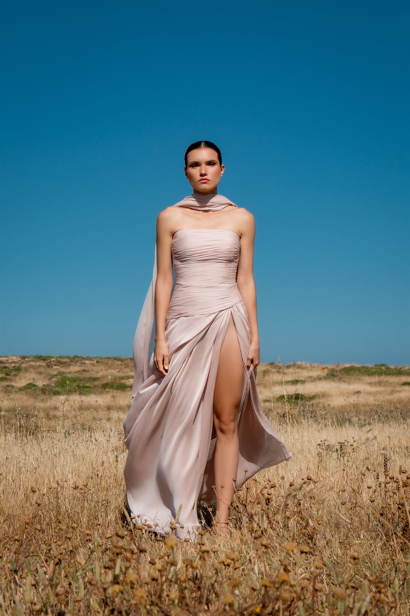 Blush ruched scarf-slit gown