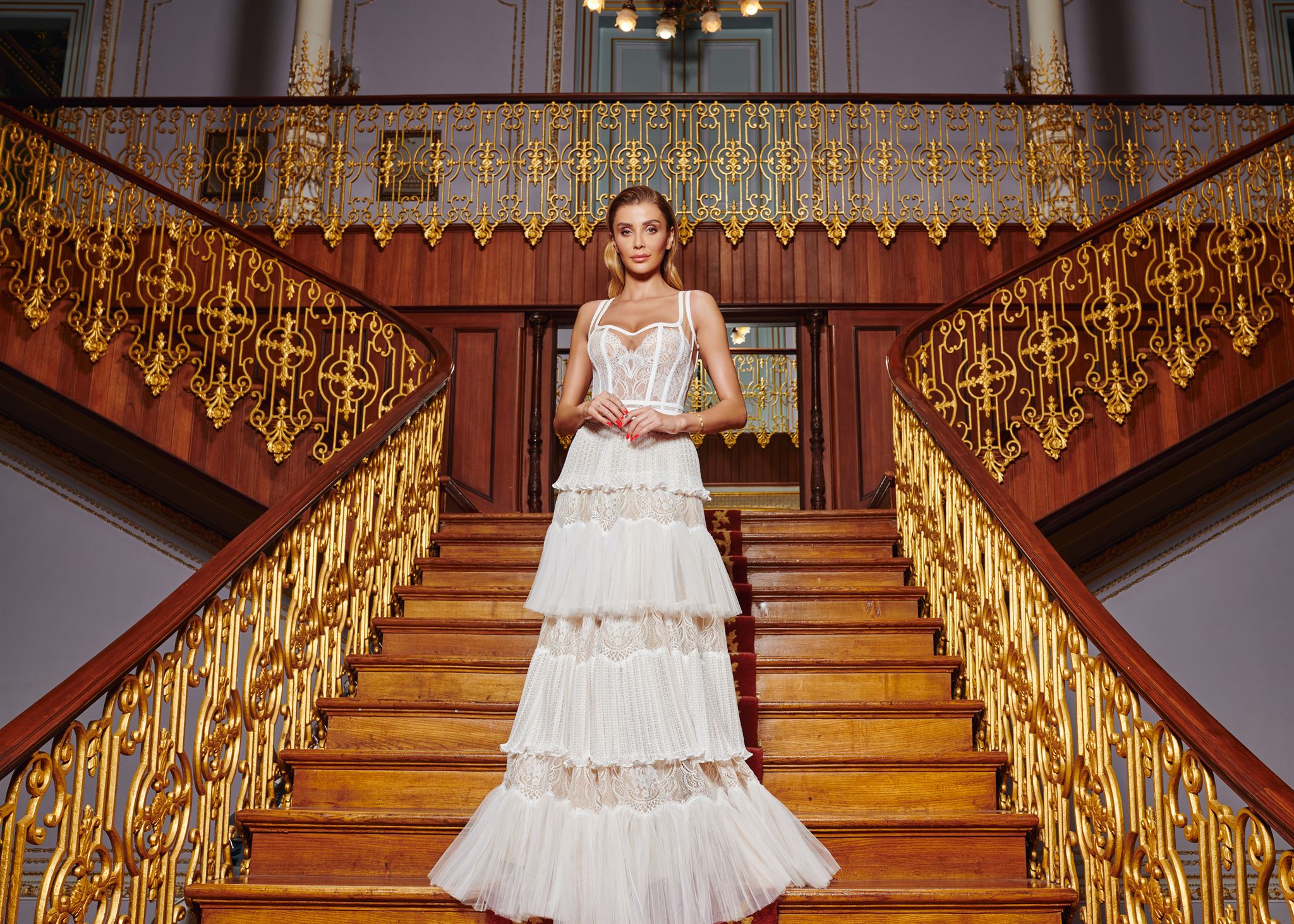 White lace and pleated-tulle tiered gown