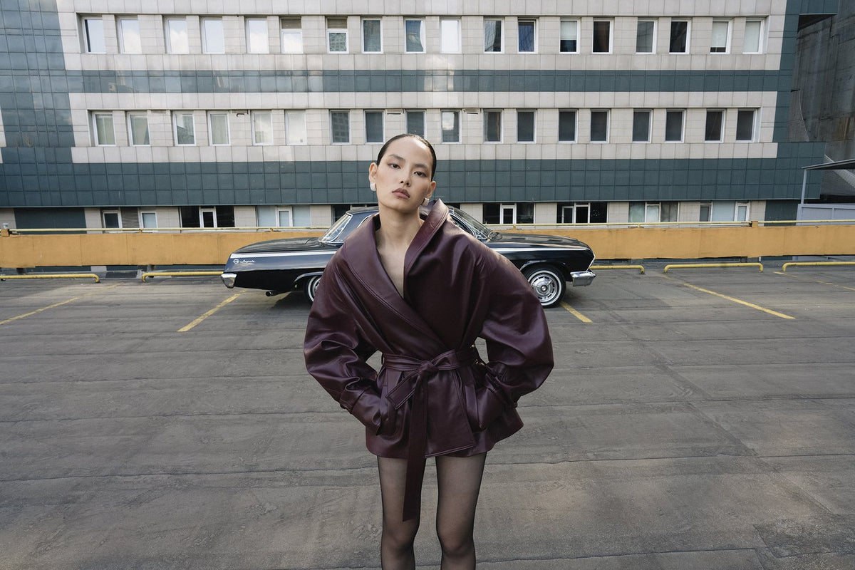 Burgundy sculptural belted jacket