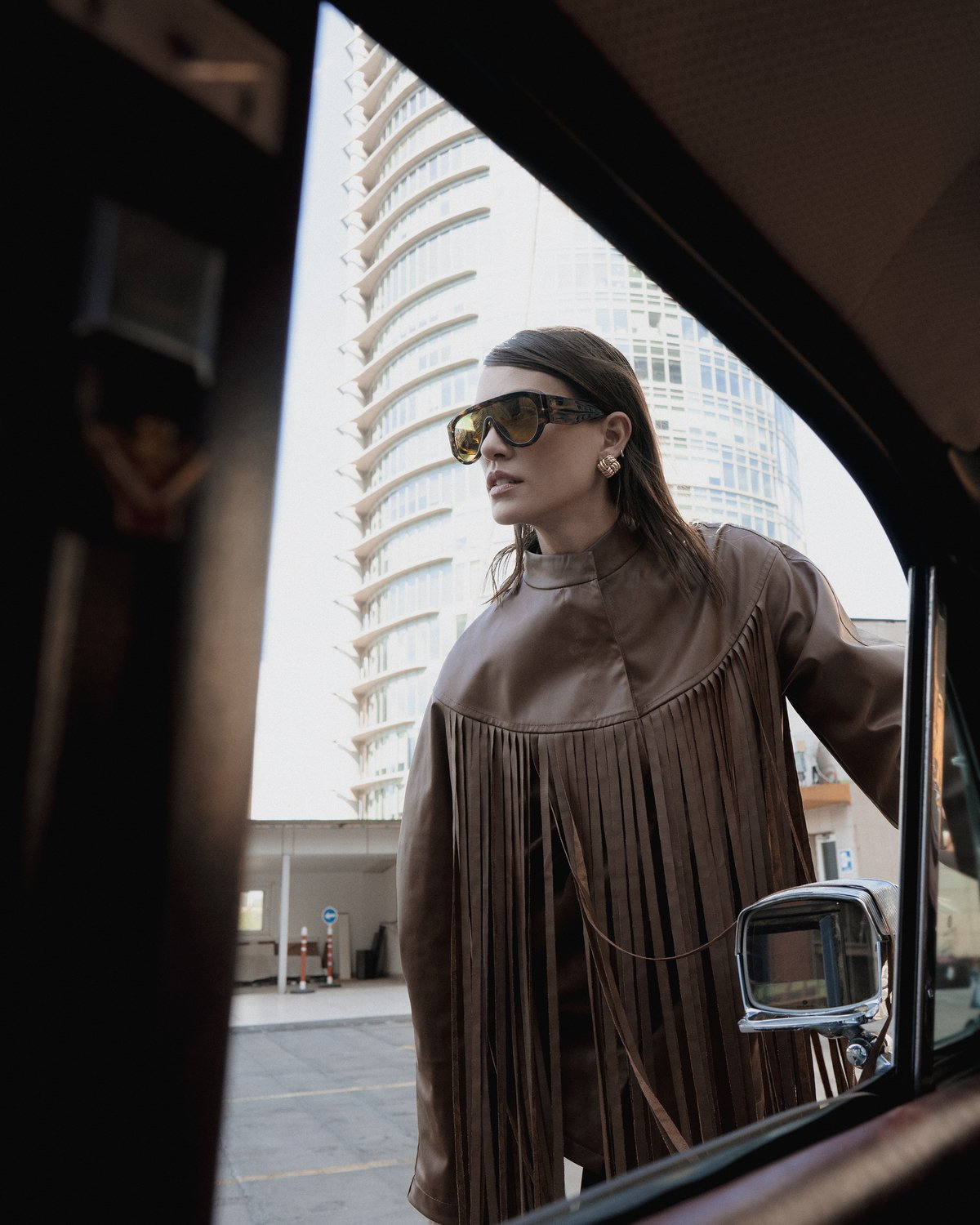 Brown leather fringe jacket