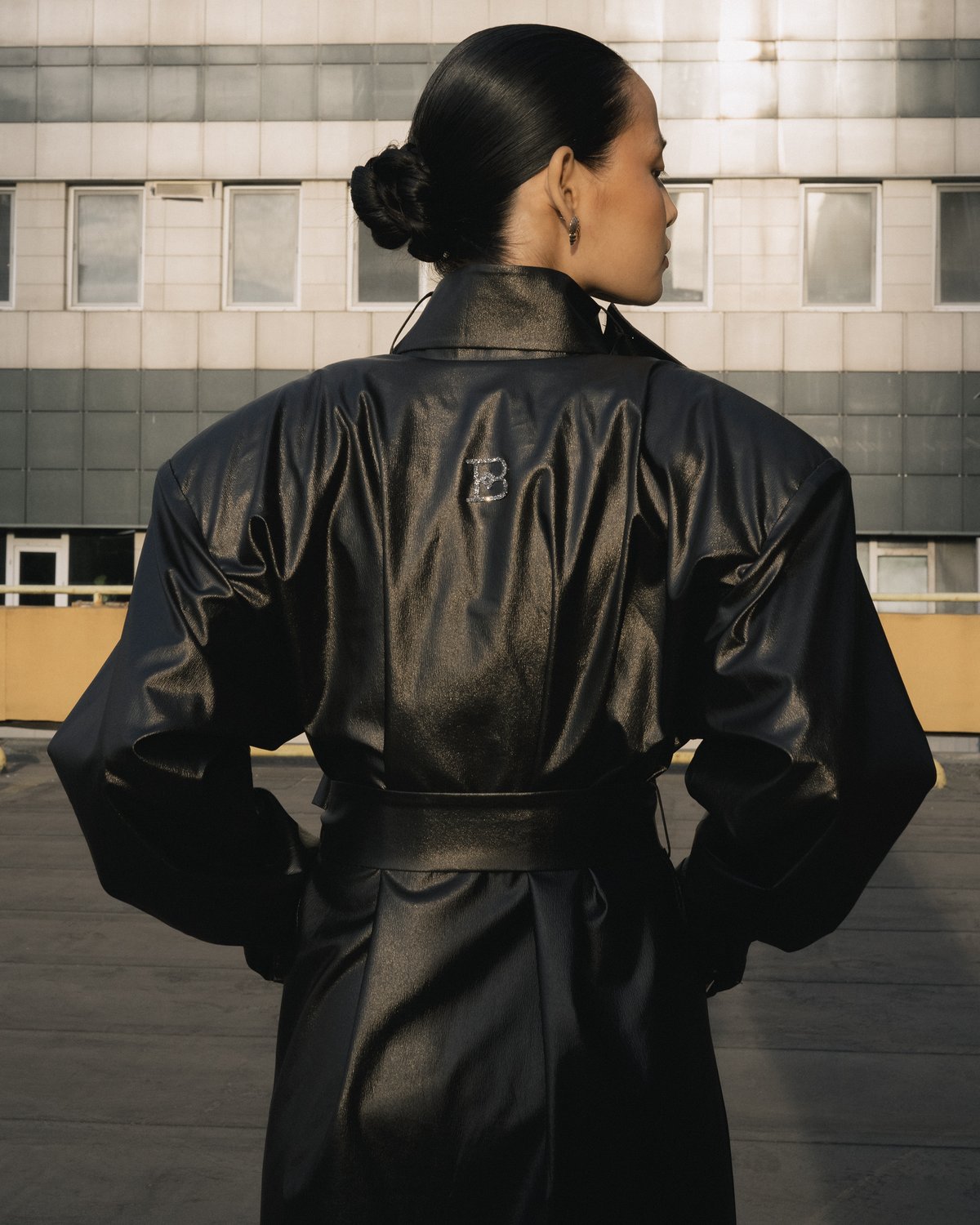 Black leather belted coat