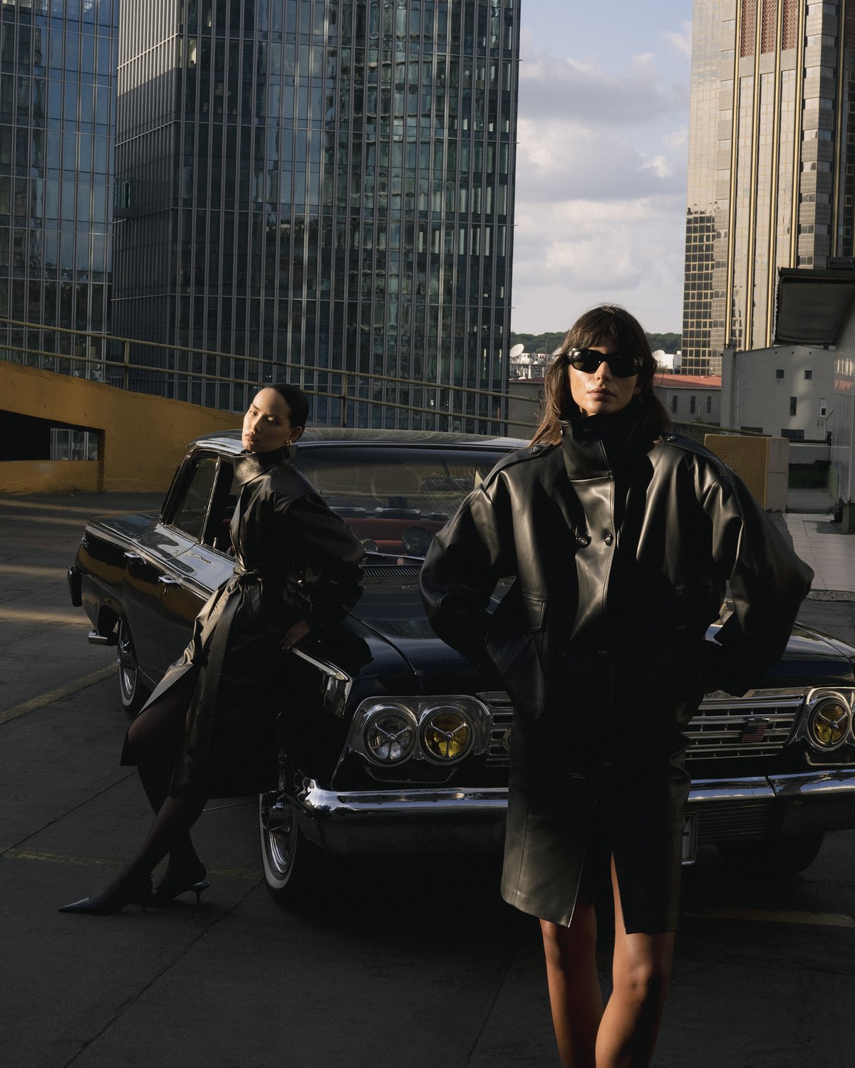 Black leather double-breasted jacket and skirt set