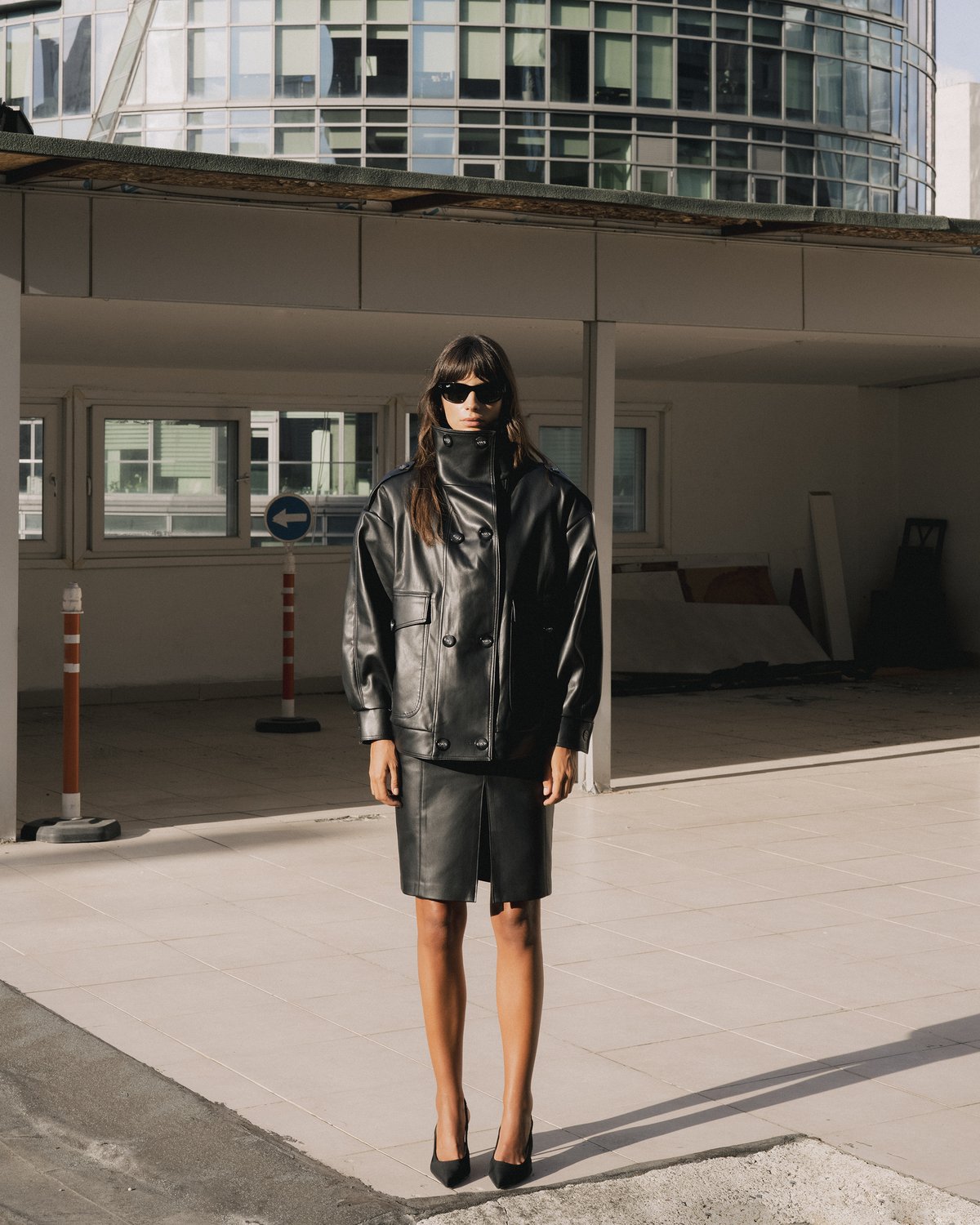 Black leather double-breasted jacket and skirt set